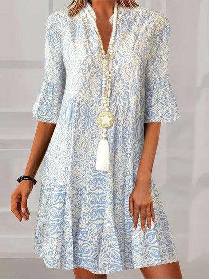 MW : Blau-weiß bedrucktes Minikleid mit halben Ärmeln im Vintage-Stil