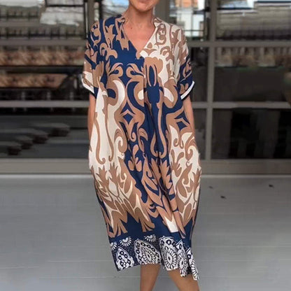 MW | Eng geschnittenes Midi-Kleid mit elegantem Druckmuster