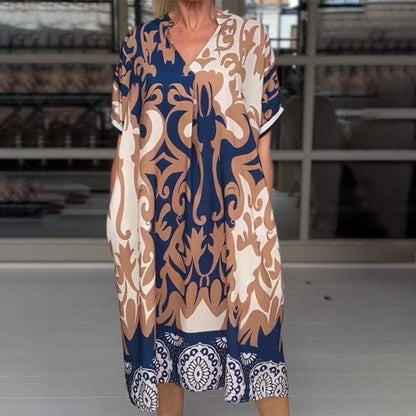 MW | Eng geschnittenes Midi-Kleid mit elegantem Druckmuster