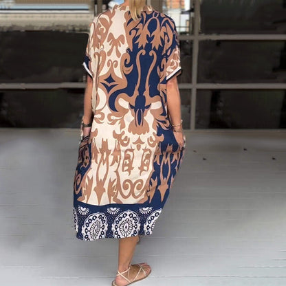 MW | Eng geschnittenes Midi-Kleid mit elegantem Druckmuster